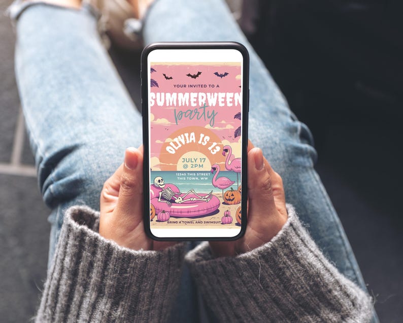 May include: A smartphone displays a pink and peach party invitation. The invitation reads "Summerween Party" with bats, a skeleton on a float, pumpkins, and a flamingo. The text includes "Olivia is 13" and the date July 17.