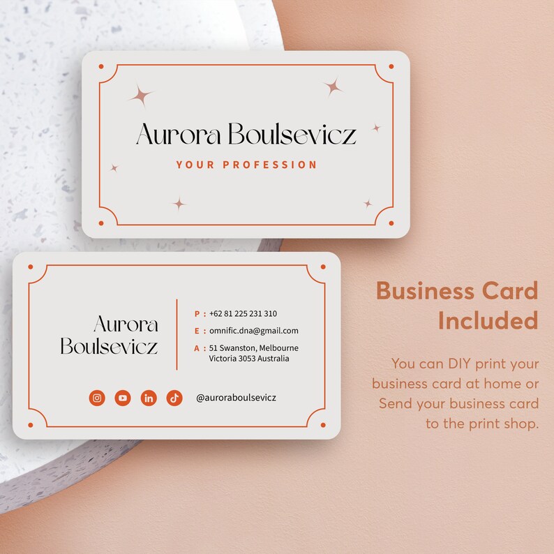May include: A white business card with a brown border and stars. The text on the card reads "Aurora Boulsevicz" and includes contact information, social media handles, and the text "Business Card Included". You can DIY print your business card at home or send your business card to the print shop.