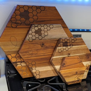 A group picture of all four sizes of our honeycomb cutting board that we offer. Ranging from 6 inch wide up to 16 inch wide