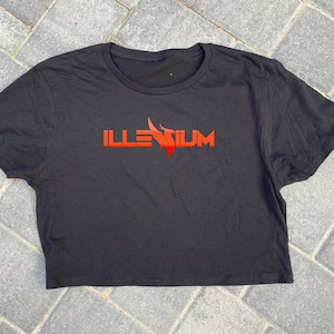 May include: Black cropped t-shirt with a red graphic of the word "ILLESIUM" with a stylized flame design.