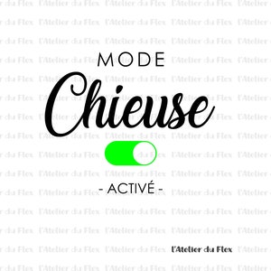 Peut inclure: Fond blanc avec le texte "MODE Chieuse - ACTIVÉ" en noir, et un interrupteur vert. La phrase "L'Atelier du Flex" est en bas en plus petit.