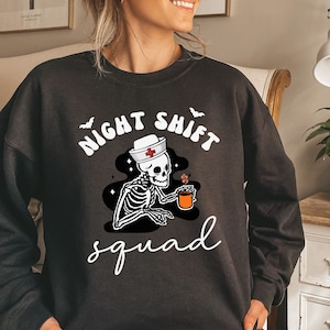 Night Shift Nurse Sweatshirt, Emergency Nurse Halloween Shirt, Funny ER Nurse Squad Shirts, RN ICU Crew Christmas Sweater, Med School Tee