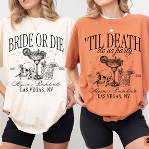 May include: Two t-shirts with a skull and margarita glass design. The white t-shirt says "Bride or Die" and the orange t-shirt says "'Til Death Do Us Party". Both shirts have the text "Alyssa's Bachelorette Las Vegas, NV" and the years "EST. 2024".