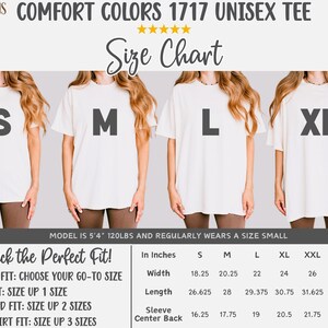 Pode incluir: Camiseta unissex Comfort Colors 1717 creme com tabela de tamanhos. A tabela de tamanhos inclui medidas em polegadas para os tamanhos S, M, L e XL. O texto "Let's Pick the Perfect Fit!" tamb&eacute;m &eacute; vis&iacute;vel.