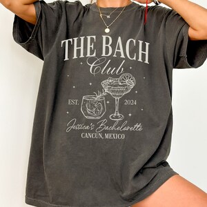 The Bach Club Shirt, Custom Location Bachelorette Shirt, Beach Bachelorette Party Shirts, Personalized Luxury Bachelorette, Bride Social Tee Pepper