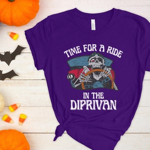 May include: Purple t-shirt with a skeleton driving a car and the text "Time for a ride in the Diprivan".