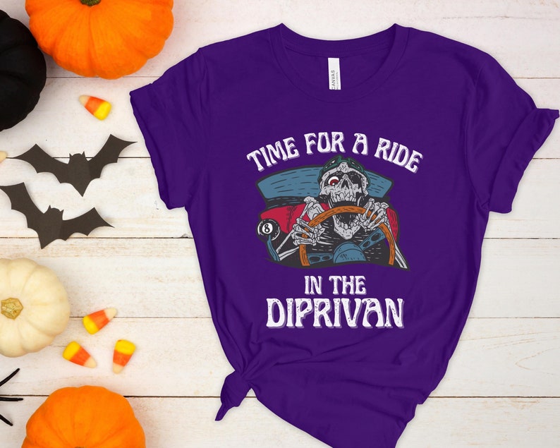 May include: Purple t-shirt with a skeleton driving a car and the text "Time for a ride in the Diprivan".