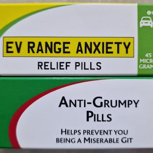 May include: Two small boxes of novelty pills. The yellow box says "EV Range Anxiety Relief Pills" with a small electric car icon. The green box says "Anti-Grumpy Pills" with the text "Helps prevent you being a miserable git". Both boxes have "45 Micro Grams" printed on them.
