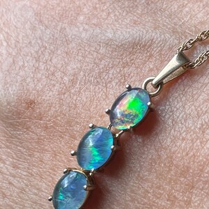 Triple opal drop pendant in gold over silver