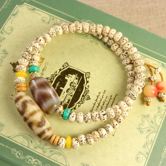 Tibetan Double Tiger Tooth One Strip, Tiger Tooth One Strip Amulet Dzi Bead Necklace / Bracelet
