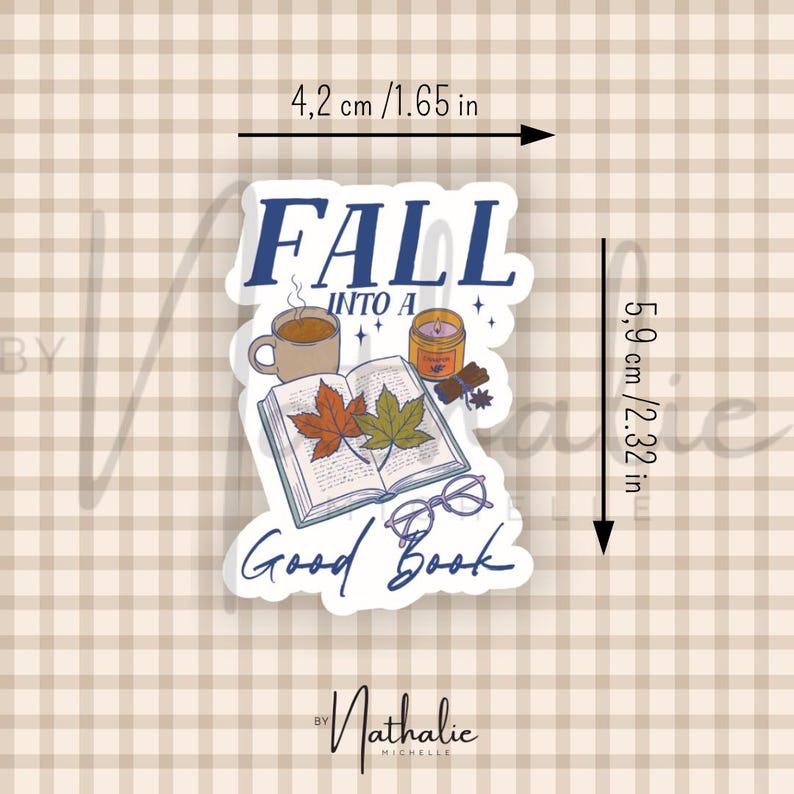 May include: A die-cut sticker featuring an open book with two autumn leaves, a mug, a candle, and glasses. The text reads FALL INTO A GOOD BOOK. It measures 1.65 inches wide by 2.32 inches high, as indicated by the visible measurement markings.