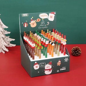 Christmas Black Gel Pens 0.5mm Retractable. 6 designs. Stationery Gifts