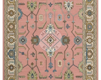 May include: A rectangular, pink area rug with an intricate floral and geometric pattern. The rug features a central medallion design and a detailed border in shades of beige, blue, green, and brown. The text "Mughal Knots" is visible in the center.