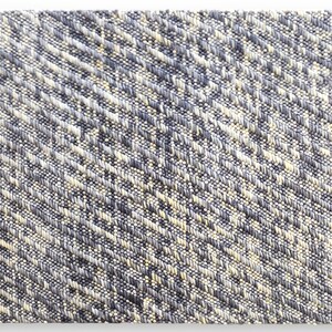 May include: Close-up of a blue and white woven fabric with a diagonal pattern.