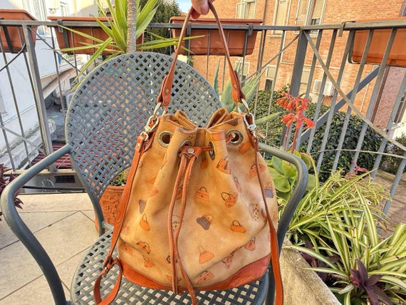 Vintage Loristella bucket bag 2000s,canvas bag with bag print leather handles. Designer Bag for woman, travel bag. Hobo bag.