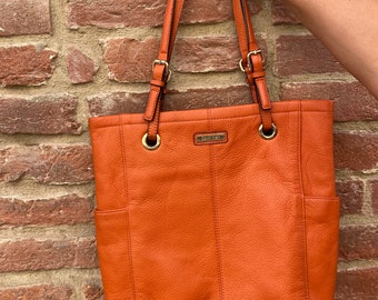 Calvin Klein orange leather Tote bag.