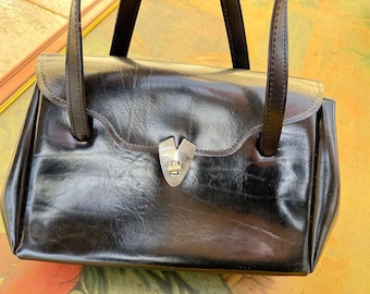 Vintage black leather envelope bag.Italian handbag 1990s.