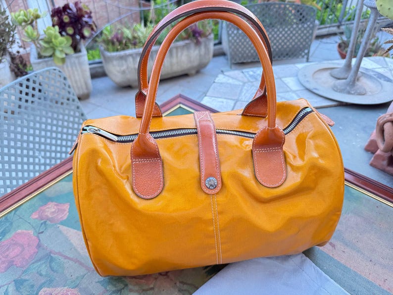 Texier Paris orange canvas duffel bag 2000s ITALIAN VINTAGE. image 1