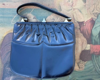 Pochette Kiss Lock vintage en cuir noir des années 1970, fabriquée en Italie