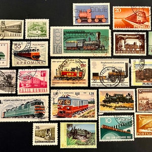 May include: A collection of vintage postage stamps featuring trains from around the world. The stamps are colorful and feature a variety of train designs, including steam engines, diesel locomotives, and electric trains. The stamps are in good condition and would be a great addition to any stamp collection.