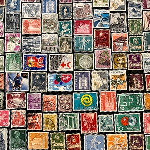 May include: A collection of vintage Swiss postage stamps featuring various designs, including landscapes, buildings, and portraits. The stamps are in different colours and denominations, and some have been cancelled with postmarks.