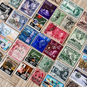 May include: A collection of vintage postage stamps from Malta. The stamps feature various designs, including a dove, a ship, a church, and a knight. The stamps are in different colors, including red, blue, green, and yellow.