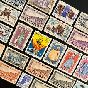 May include: A selection of vintage Senegalese postage stamps, displaying diverse designs and values. The stamps depict people, landscapes, and historical figures, with French text. The stamps are arranged on a black background.