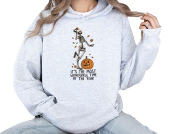 Christmas Fall Time Spooky Skeleton Dance Pumpkin Hoodie, Halloween Meets Christmas Hoodie, Most Wonderful Time Of The Year Skeleton Hoodie