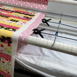 Takes the weight off the clamps.  With different type of clamp system