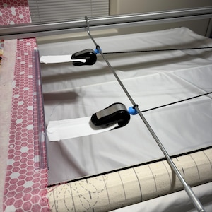 Takes the weight off the clamps.  With different type of clamp system