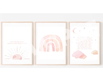 May include: Three watercolor prints with a pink and orange color scheme. The first print features a pink sun with rays and the text "Let the light of your soul shine". The second print features a pink and orange rainbow. The third print features a pink crescent moon, stars, and clouds with the text "May your dreams be filled with wonder and magic".