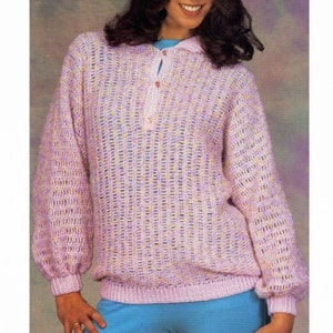 May include: A crocheted sweater in a light pink color with a multi-colored yarn. The sweater has a collar and a button closure.