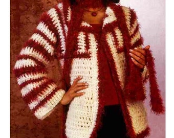 May include: A white and red crocheted cardigan with a fuzzy texture. The cardigan has a shawl collar and long sleeves.