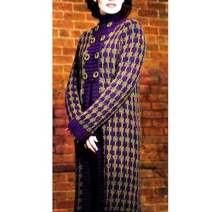 May include: A long purple and green crocheted cardigan with a button closure. The cardigan has a textured pattern and is shown on a model.