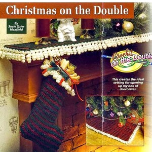 May include: A festive image showcasing a crocheted Christmas stocking with red and green stripes, accented with white trim and embellishments. The image includes the text "Christmas on the Double" and "Crochet on the Double".
