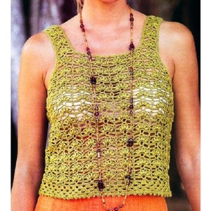 May include: A green crochet tank top with a square neckline. The tank top is made with a delicate open stitch pattern.
