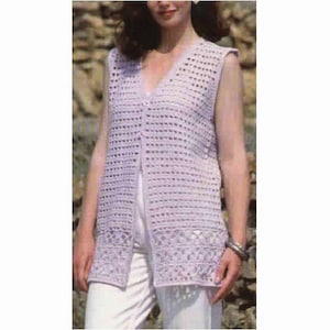 May include: A light purple crochet vest with a button fastening and a crocheted trim. The vest is sleeveless and has a V-neck.