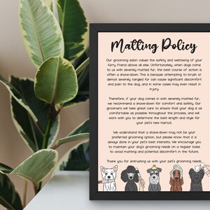 May include: A pink and white sign with black text that reads "Matting Policy". The sign explains the grooming salon's policy regarding matted fur. The sign is illustrated with five cartoon dogs of different breeds, each holding grooming tools.