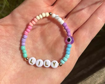 Multicolour gradient eye bead bracelet with name, personalised evil eye bracelet, glass seed bead bracelet with charm bead, silver or gold