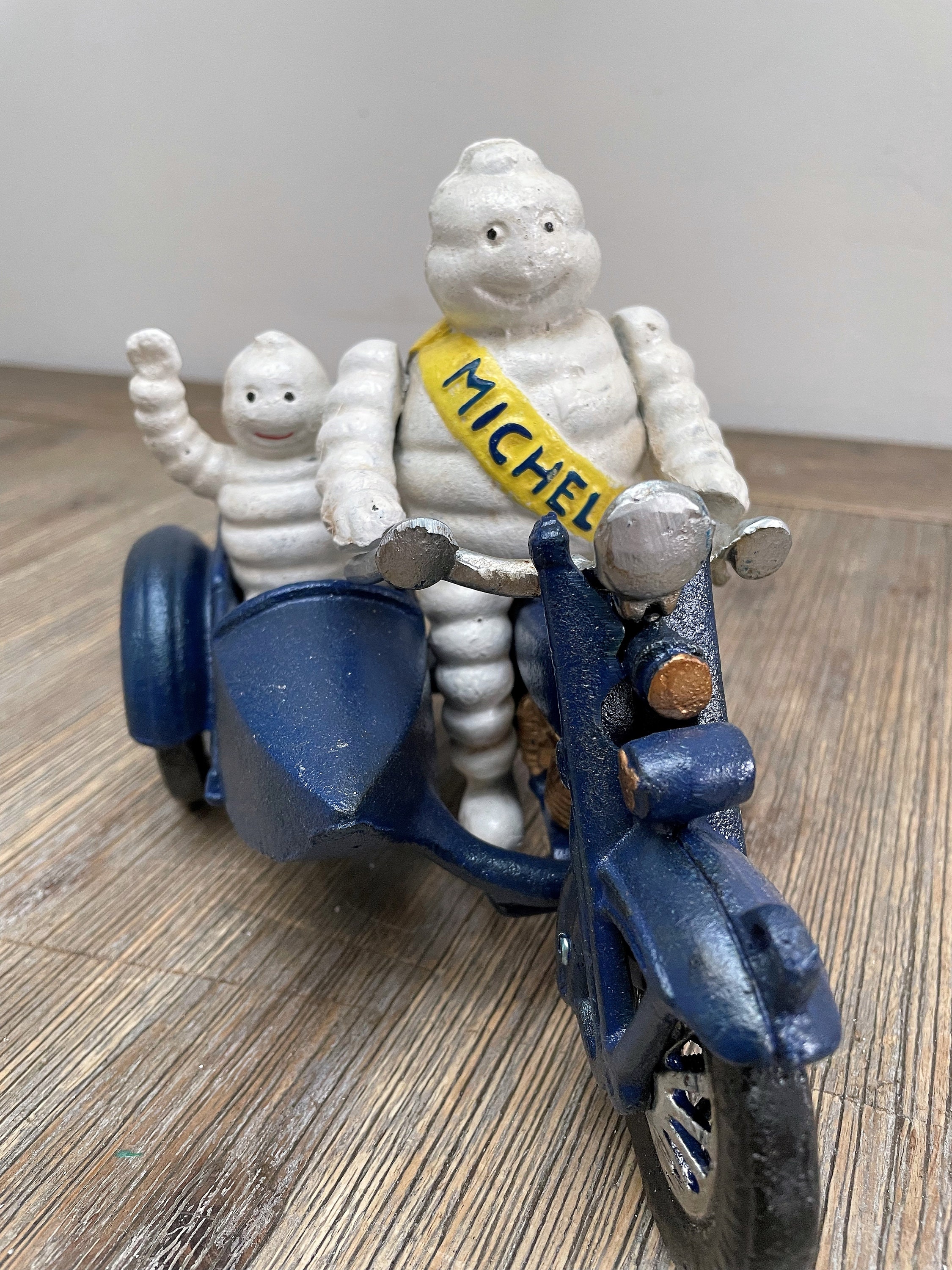 Michelin Man Riding Motorbike With Sidecar - Michelin Mascot