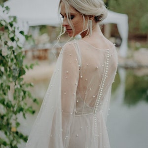Blush wedding dress with pearls image 4