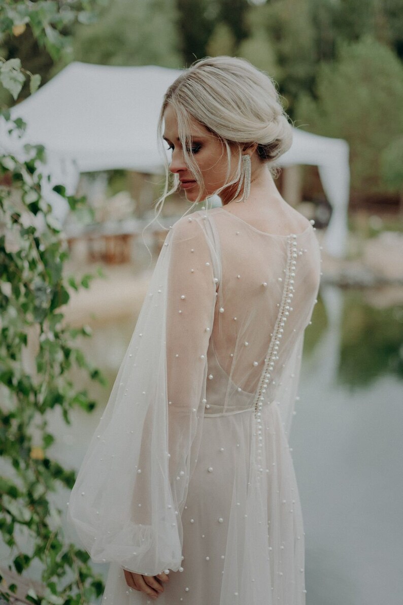 Blush wedding dress with pearls image 4