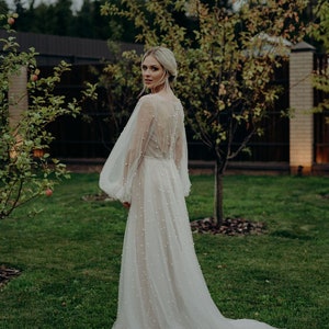 Blush wedding dress with pearls image 5