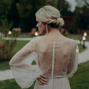 Blush wedding dress with pearls image 3