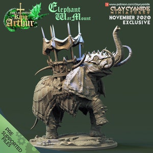 May include: A detailed 3D printed model of an elephant war mount, with a canopy and a howdah. The model is painted in a light gray color and is ready to be assembled and painted. The model is part of a series of miniatures based on the legend of King Arthur.