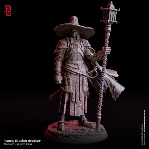 May include: A miniature figurine of a fantasy character wearing a wide-brimmed hat, armor, and a cloak. The character holds a staff with a lantern on top. The figurine is painted in a bronze color and stands on a 25 mm base.