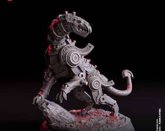 May include: A detailed, gray metal sculpture of a stylized, mechanical panther. The sculpture is posed in a dynamic, leaping stance with its mouth open, revealing sharp teeth. The panther is standing on a rocky base.
