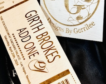 May include: A wooden ticket with the text "Girth Brokes Add One" and a barcode. The ticket is for a show at The Colosseum at Caesars Palace in Las Vegas, Nevada on Saturday, April 20th, 2024. The ticket also has a small graphic of a cowboy hat.