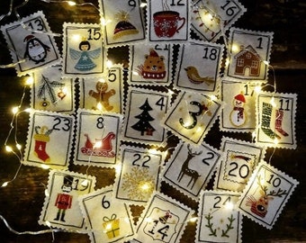 May include: A Christmas advent calendar with 24 numbered squares, each featuring a different festive illustration. The squares are decorated with a white border and are arranged in a random pattern.