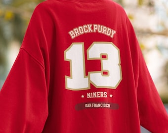 Sudadera de Brock Purdy de los 49ers: cuello redondo de fútbol americano de los San Francisco Niners